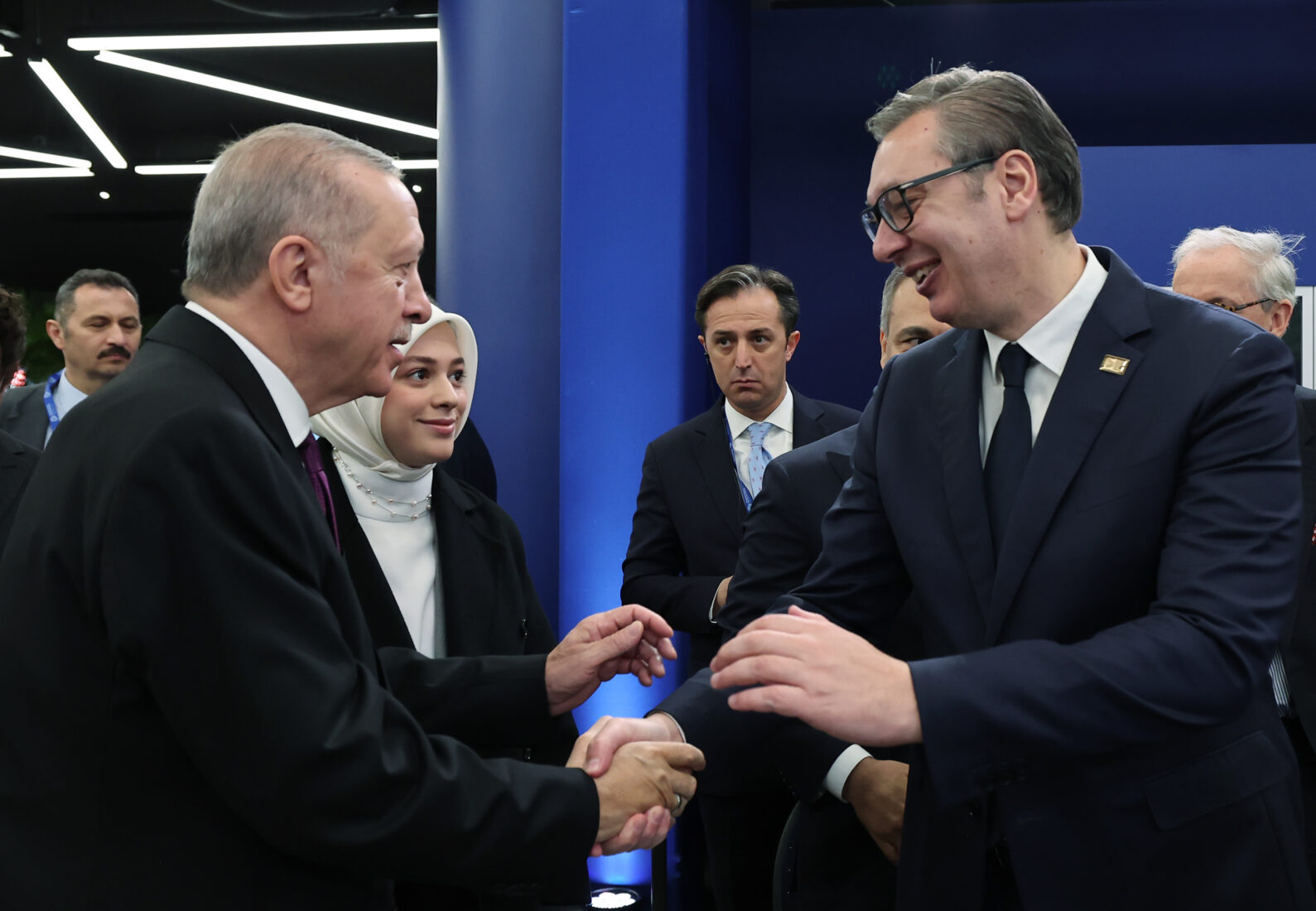 Turkish President Recep Tayyip Erdogan (L) shakes hands with Serbian President Aleksandar Vucic 