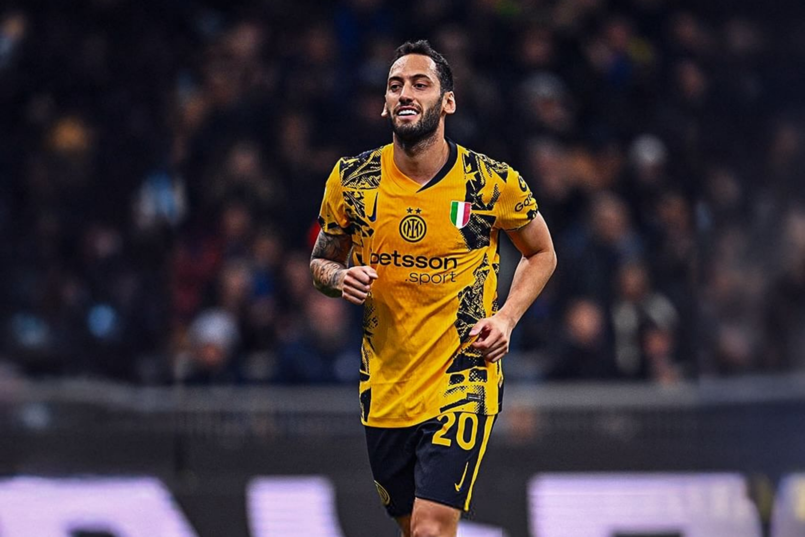 Making his comeback, Hakan Calhanoglu in action during Inter