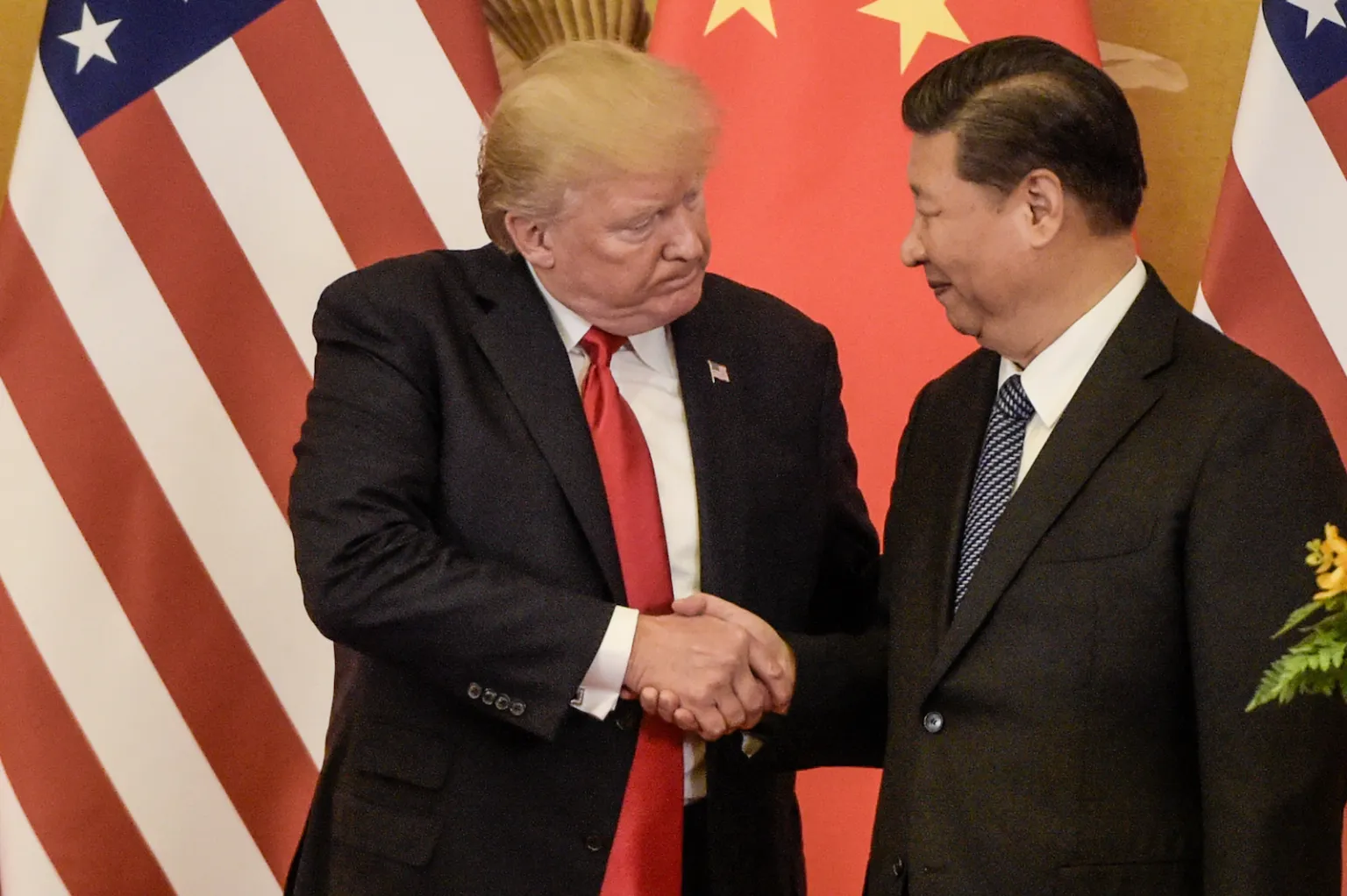 China 'will never surpass us,' says Biden in farewell address