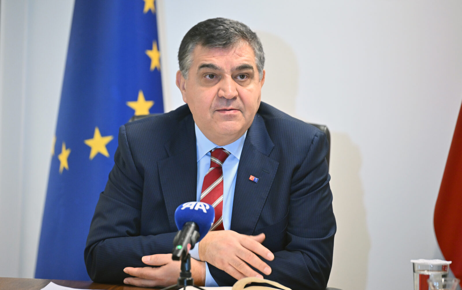 Photo shows Turkish Ambassador Faruk Kaymakci (center)