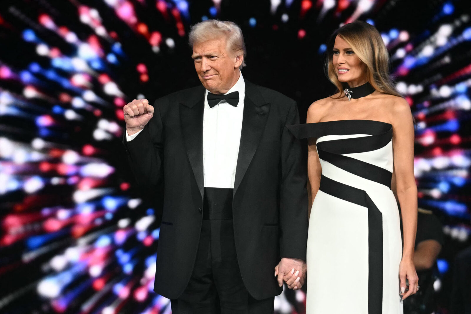 US President Donald Trump (L) and First Lady Melania Trump arrive for the Liberty inaugural ball in Washington, DC