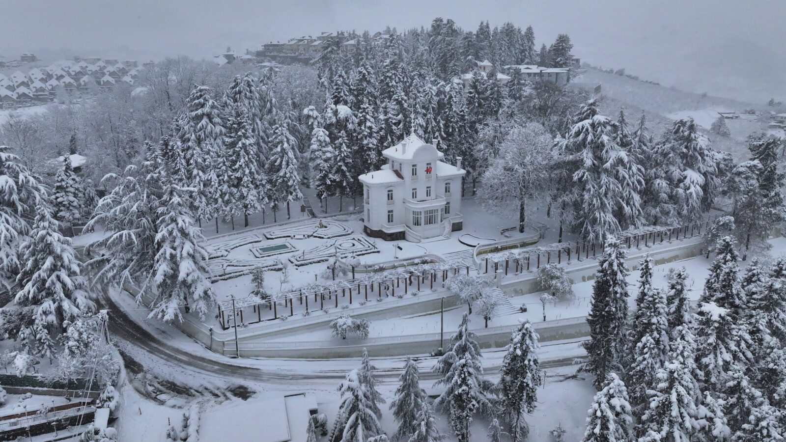 Aerial view of the snow-covered Ataturk Mansion in Trabzon, Türkiye.