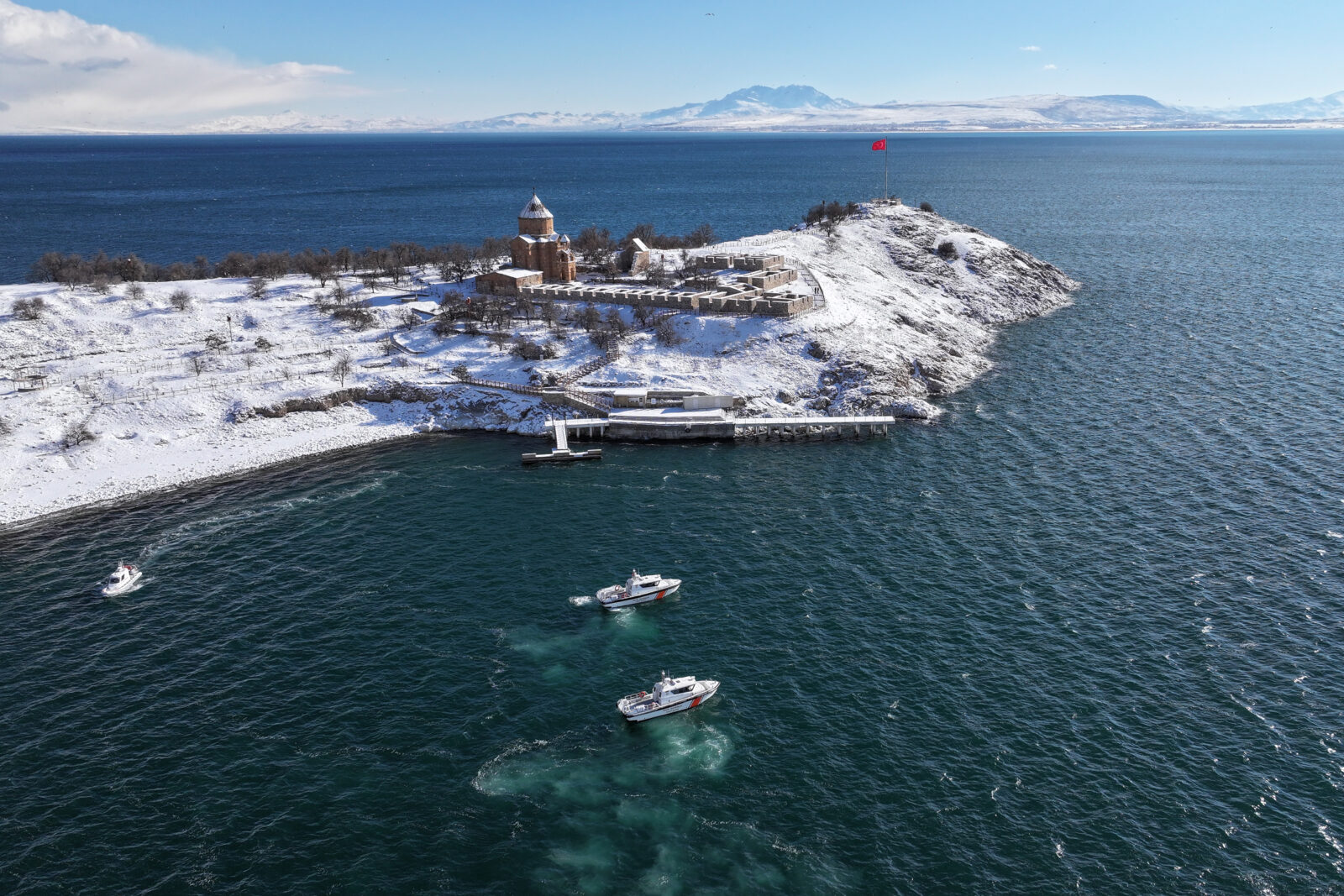 Aerial view of Akdamar Island, snow-covered, in Lake Van, Van, Türkiye.