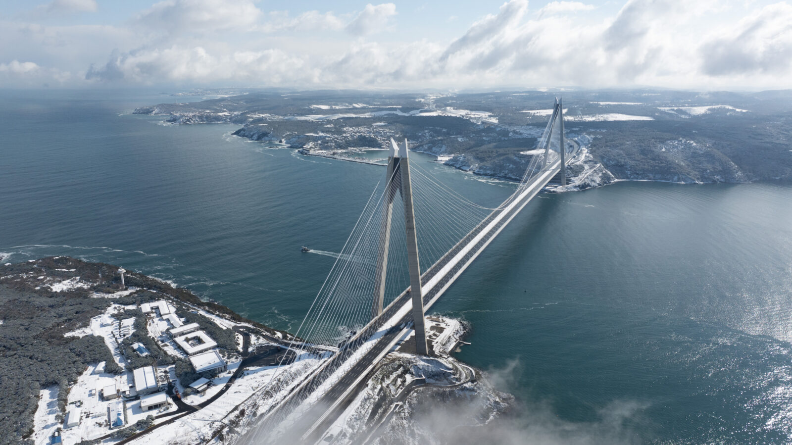 Aerial view of Sariyer district in Istanbul, Türkiye, with ongoing snowfall.