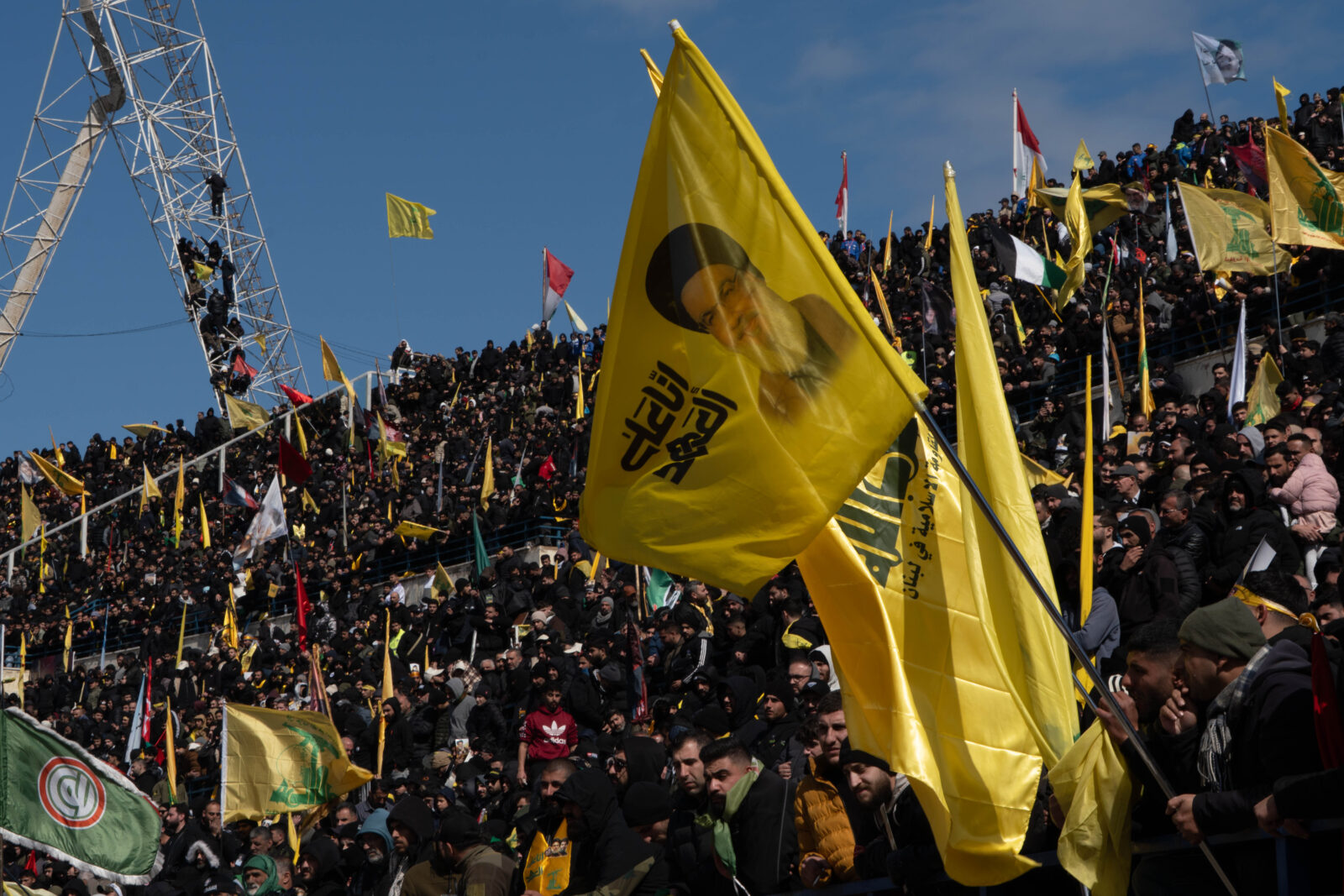 Thousands of mourners seen gathering at Camille Chamoun Sports City Stadium for the funeral of former Hezbollah chief Hassan Nasrallah.