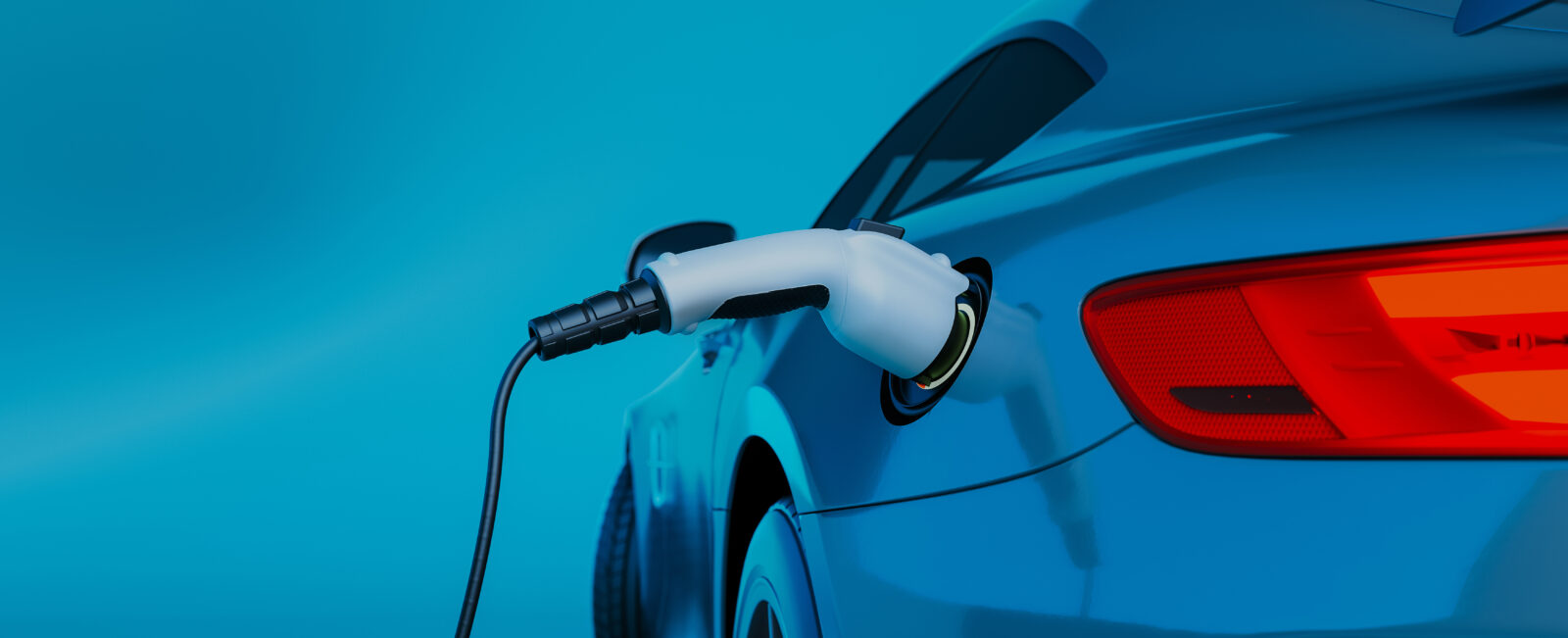 A blue electric vehicle plugged into a charging station against a bright blue background.