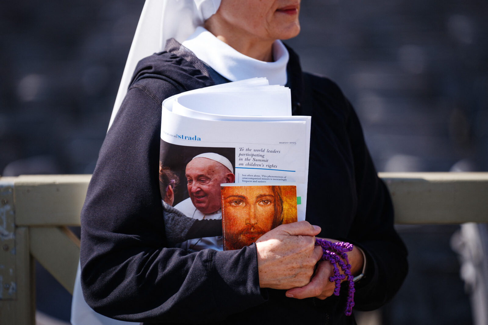 A nun walks with the 