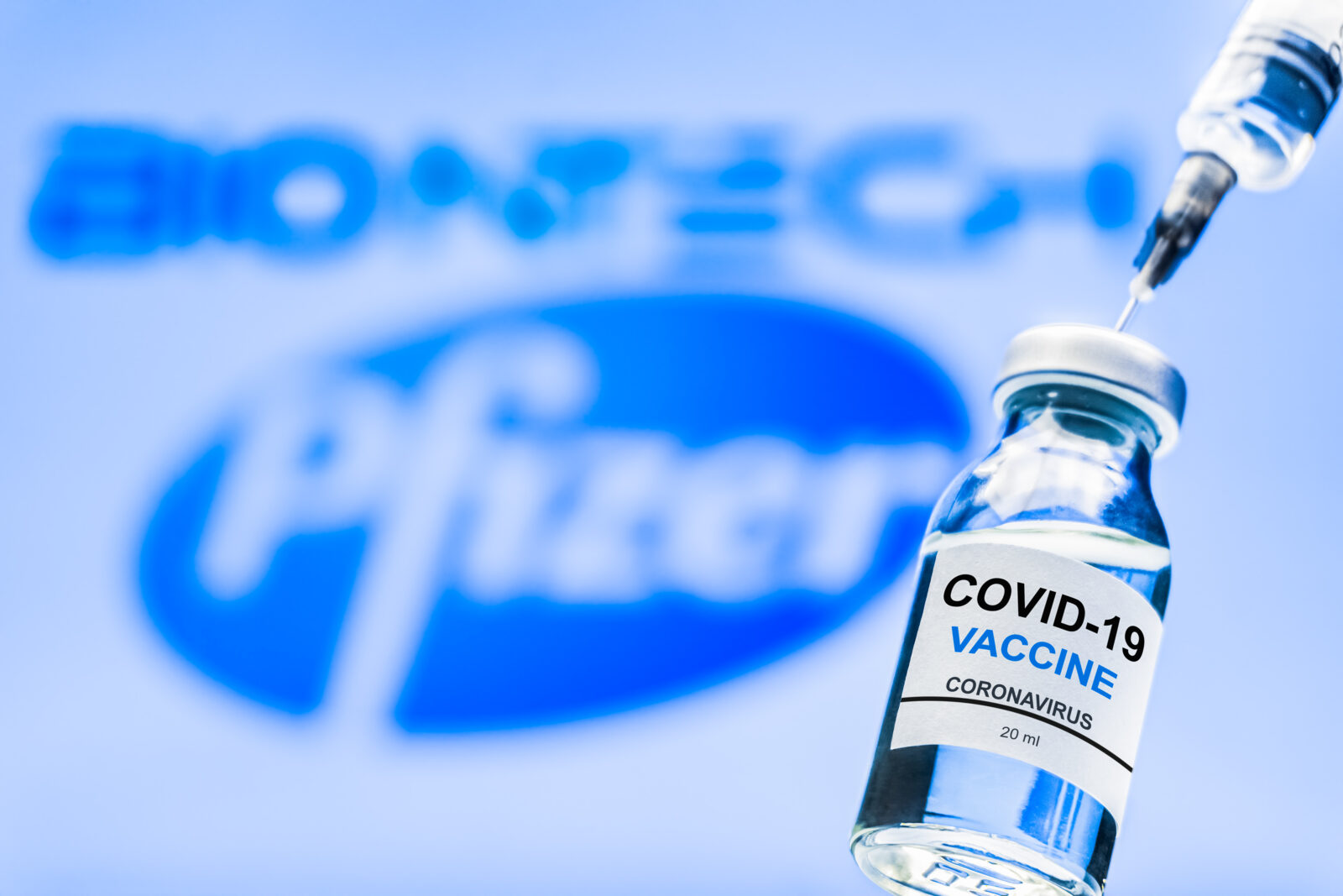 Coronavirus vaccine concept and background. New vaccine pfizer and biontech isolated on blue background. Covid-19, 2019-nCov, SARS-CoV2 pandemic.