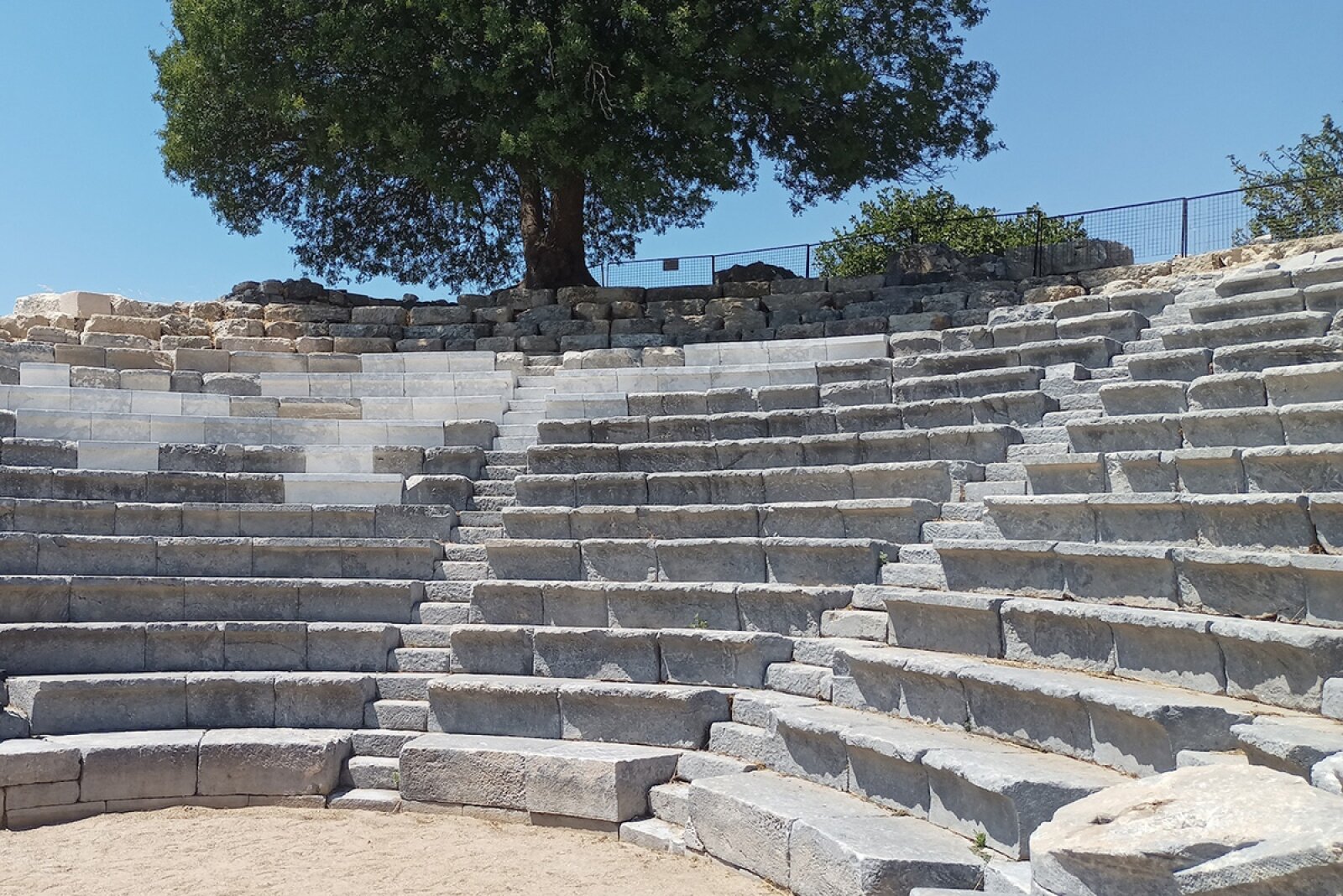 Ancient stone seating from the bouleuterion in Teos, near Izmir, Türkiye. The structure once hosted civic meetings and later underwent changes during the Roman period.