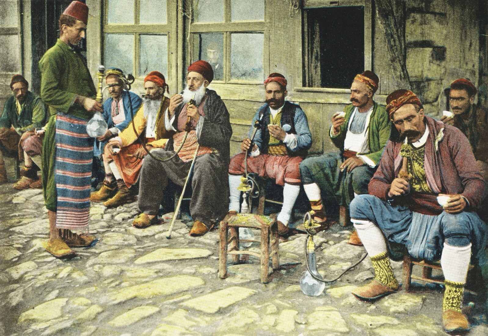 Men smoking hookah in 1898