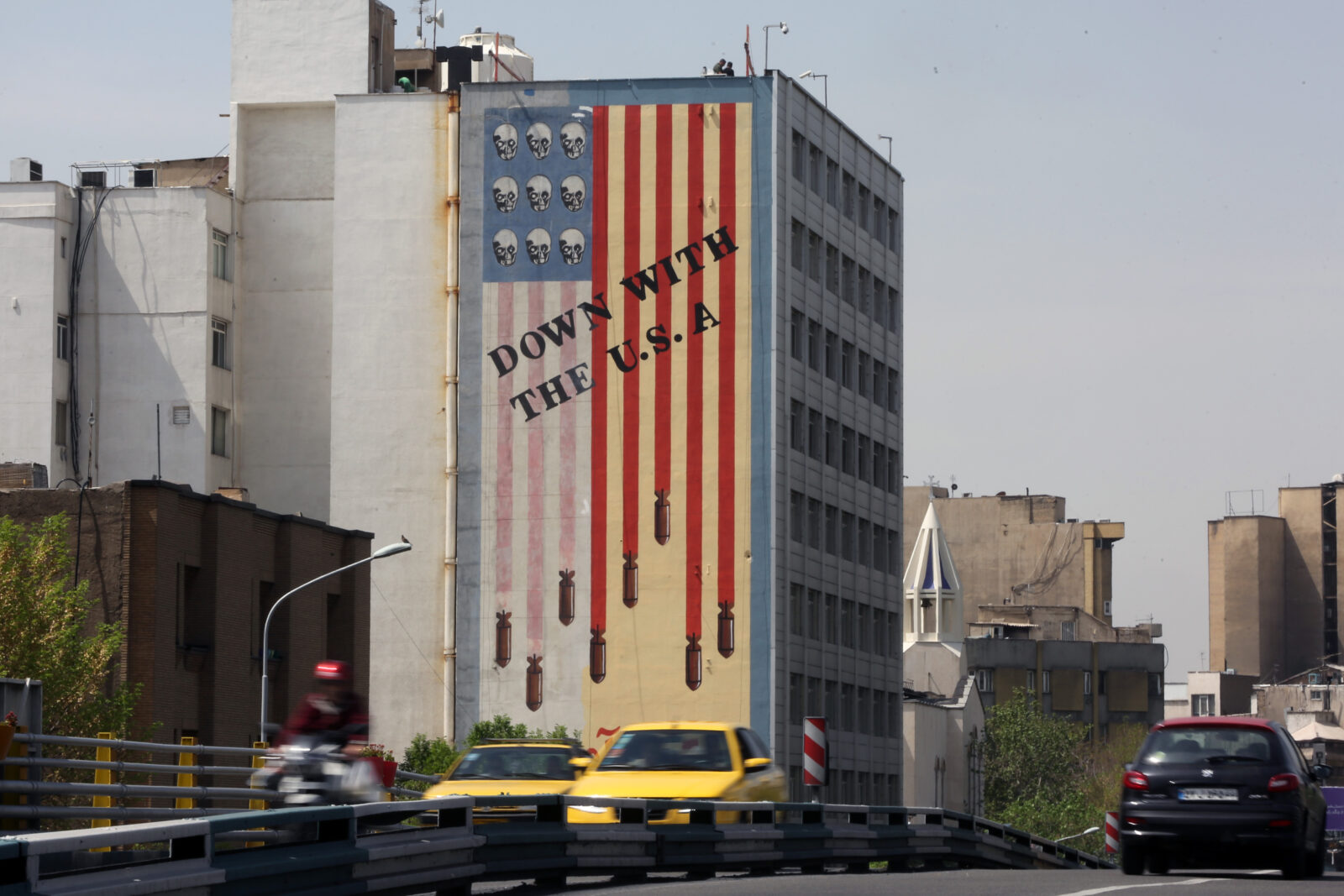 Photo shows a general view of a giant anti-U.S. mural.