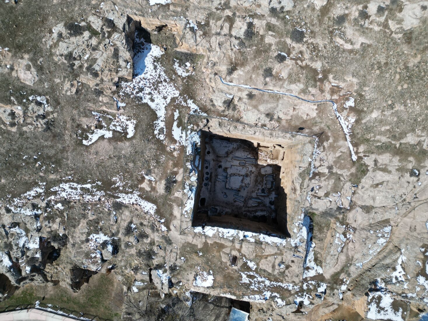 Aerial view of the well-preserved Gümüşler Monastery in Cappadocia, Nigde, Türkiye.