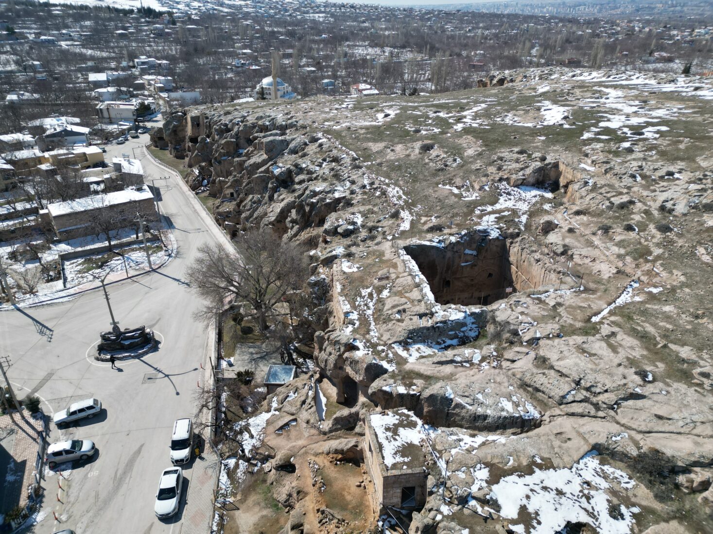 Aerial view of the well-preserved Gümüşler Monastery in Cappadocia, Nigde, Türkiye.