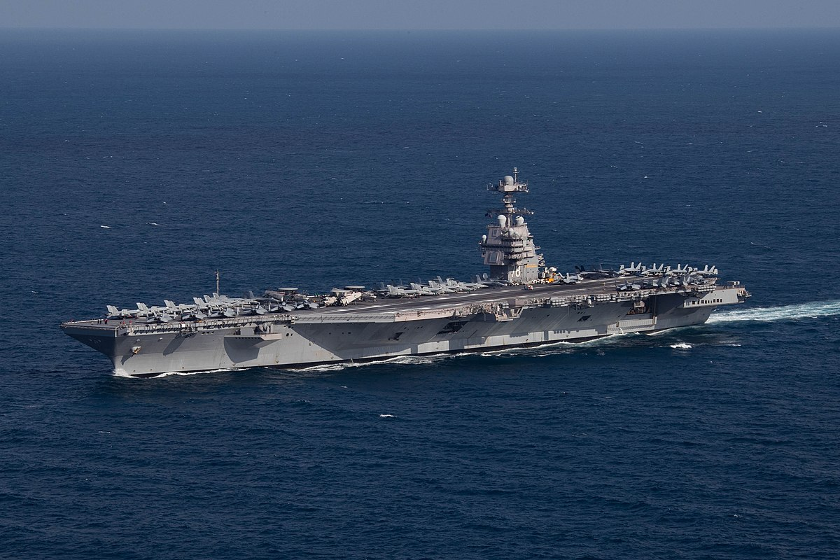 The U.S. Navy aircraft carrier USS Gerald R. Ford (CVN-78) steams the Atlantic Ocean during a simulated straits transit with the Gerald R. Ford Carrier Strike Group (GRFCSG) in the Atlantic Ocean,